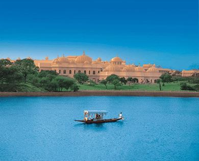 Shikara boat for guest transfers at The Oberoi Udaivilas, Udaipur